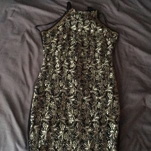 It a dress and from the back it’s open a little